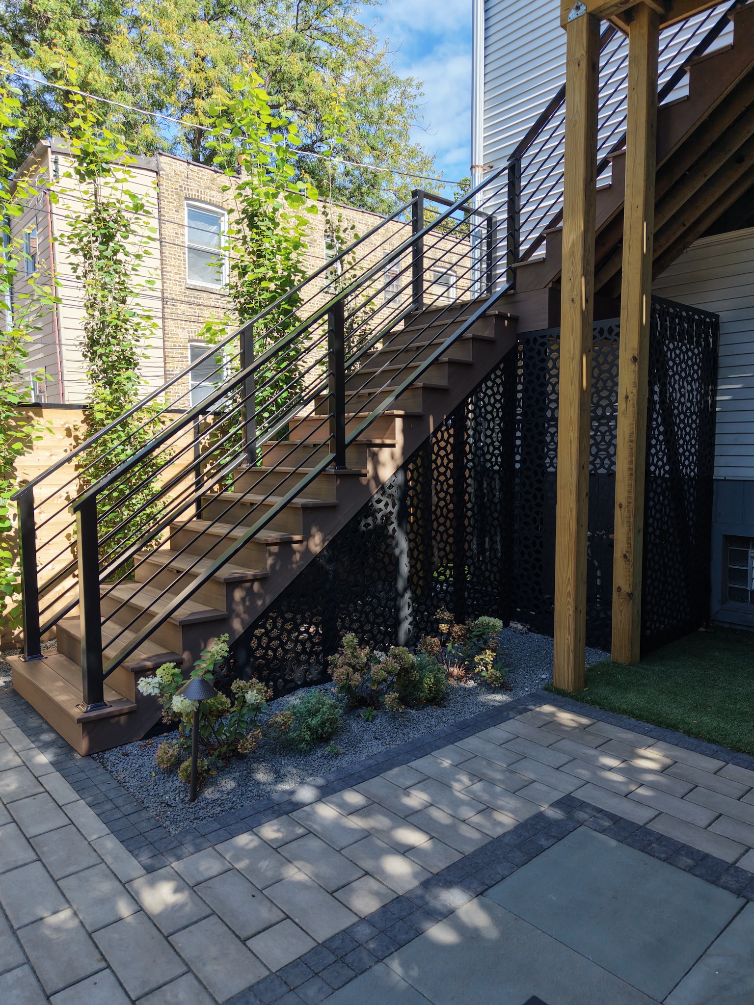 Himsben exterior staircase with Acurio lattice Chicago